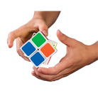 Quick cube being solved by two hands on a white background