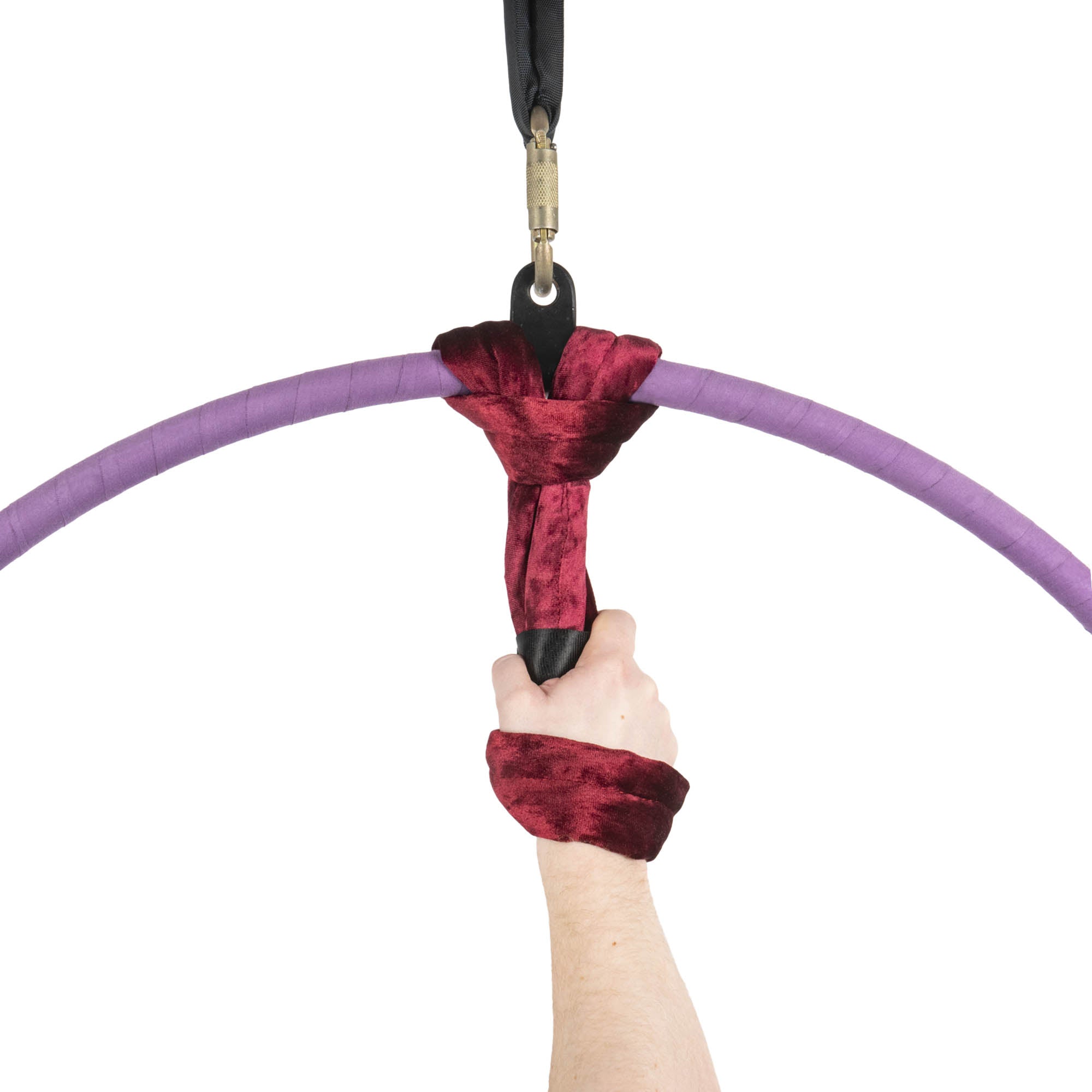 Burgundy velvet hand loop attached to one point aerial hoop in hand