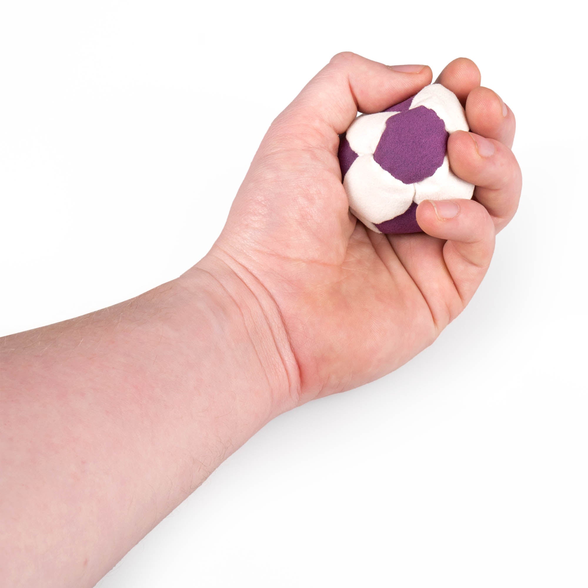 Purple and white hacky sack in hand