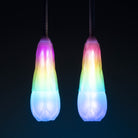 Flowtoys vision spin poi glowing with dark background whilst hanging