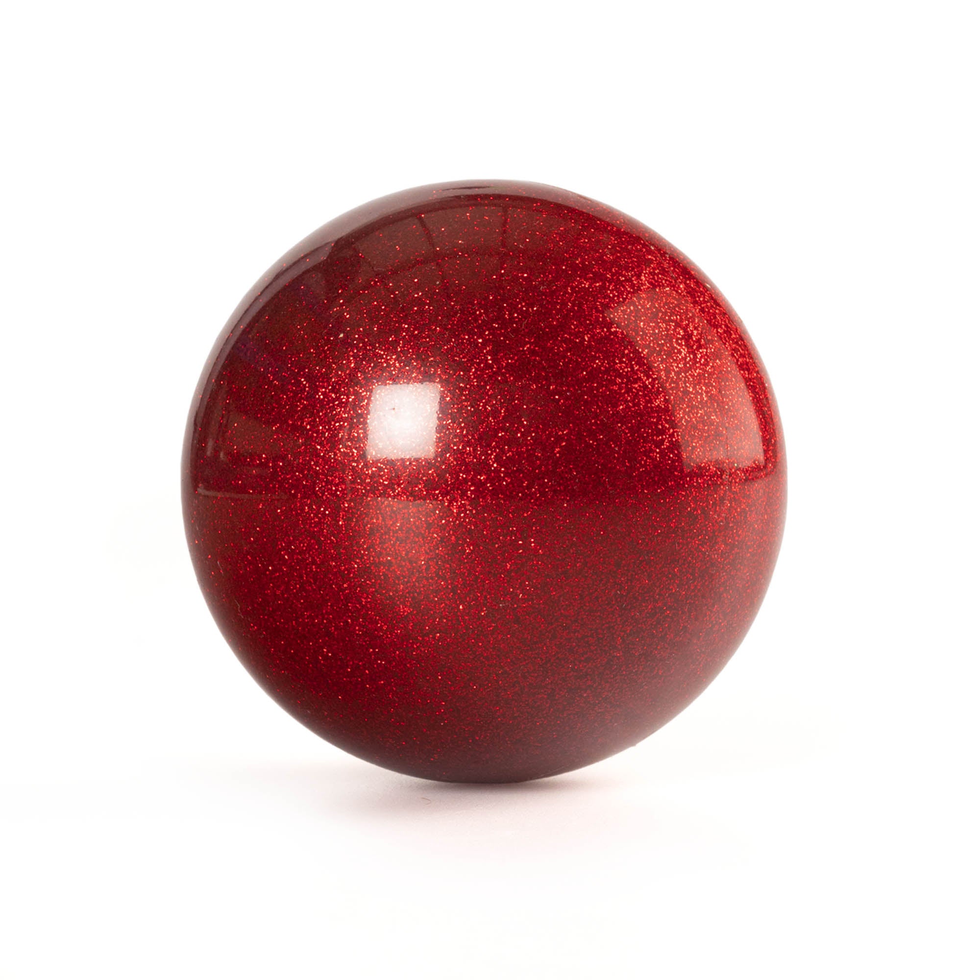 Red glitter ball on a white background