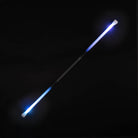 Full length LED staff lit on black background