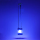 TriX 3.0 hanging and glowing blue, the light is bright and illuminating the surroundings.