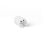 Light unit with button on white background