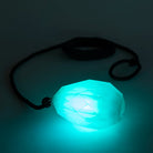 Glowing blue dart on a dark background