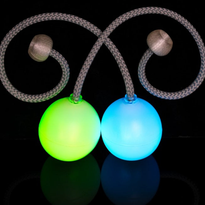 flowtoys flowmoja contact poi, one glowing blue and one glowing green