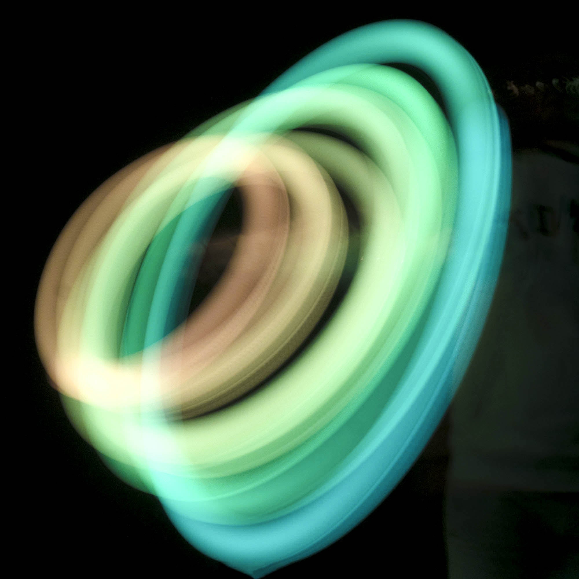 LED poi spinning with light trails