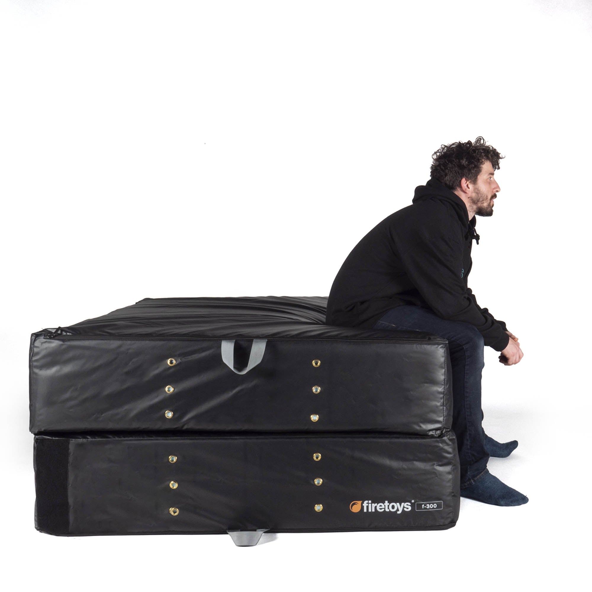 sitting on folded crash mat