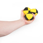 Yellow and black three balls in hand