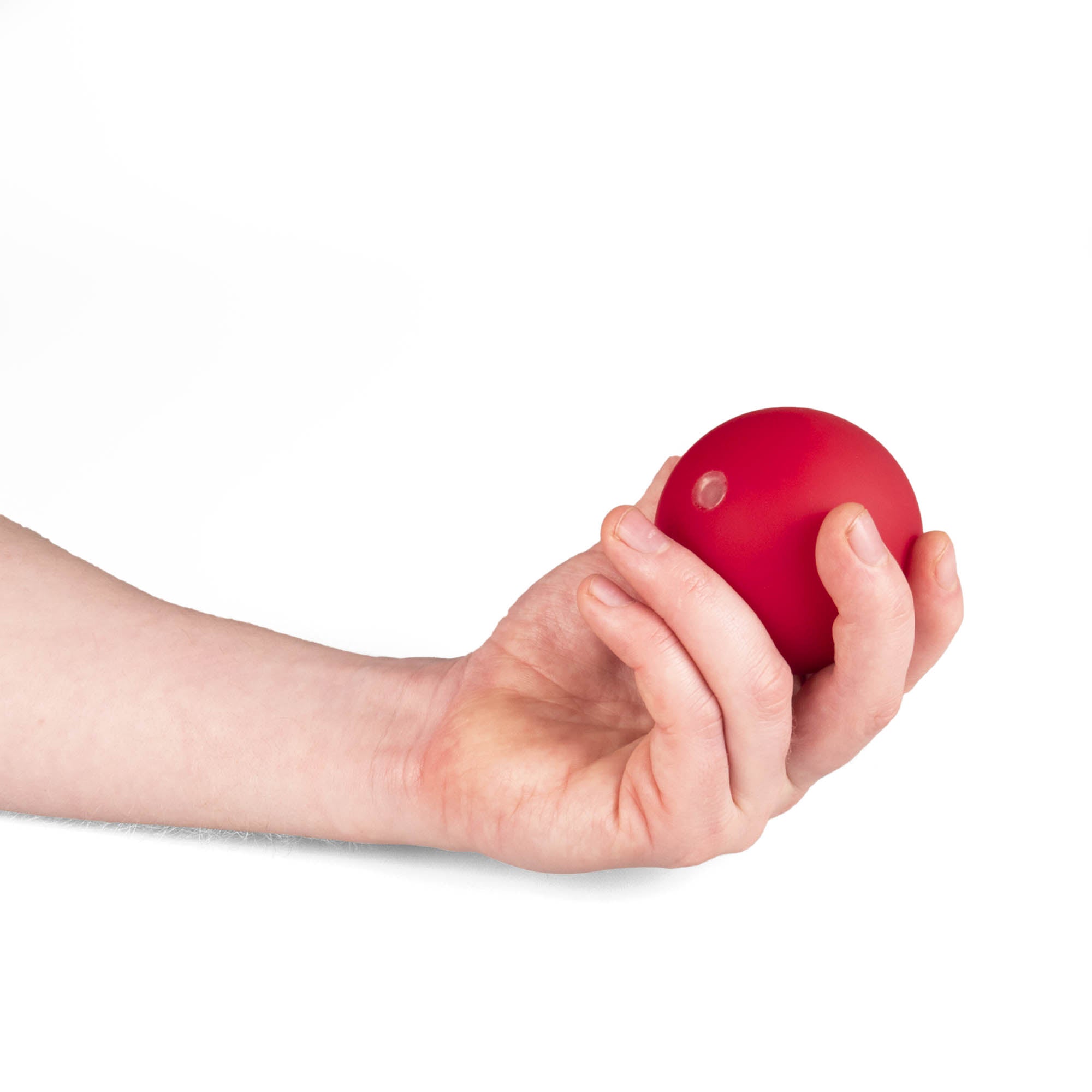 Single red Mr Babache russian juggling ball in hand