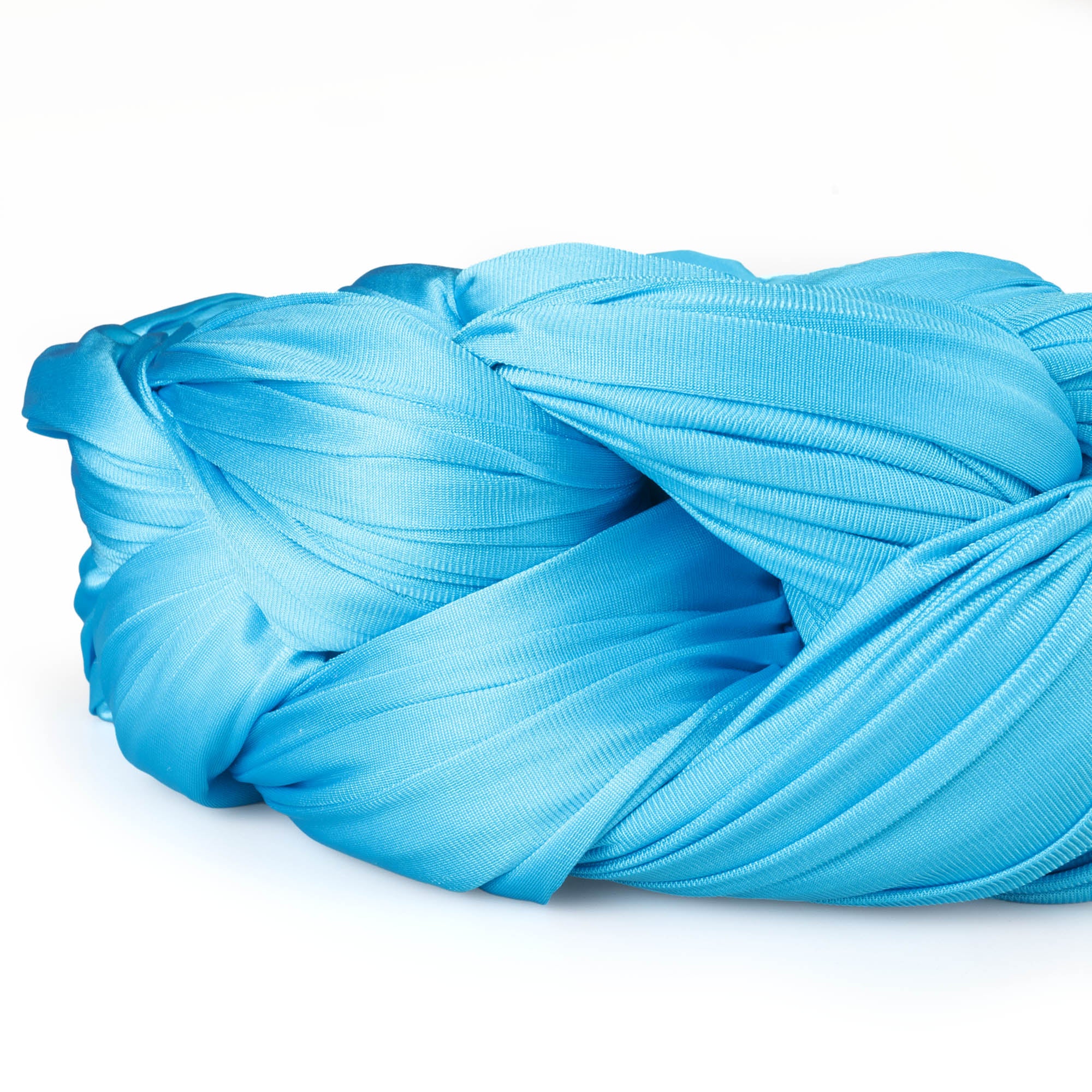 Turquoise silk coiled