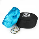 turquoise sling with o-rings resting on hammock bag