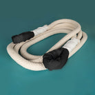 Prodigy braided cloud swing coiled on coloured background